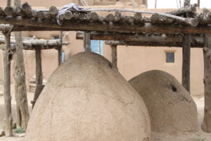 Taos kilns/ovens, made of adobe mud and straw